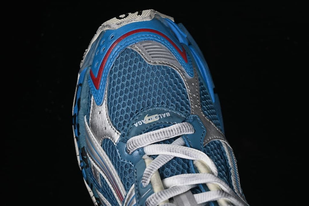 Top view of the blue mesh toe and white laces