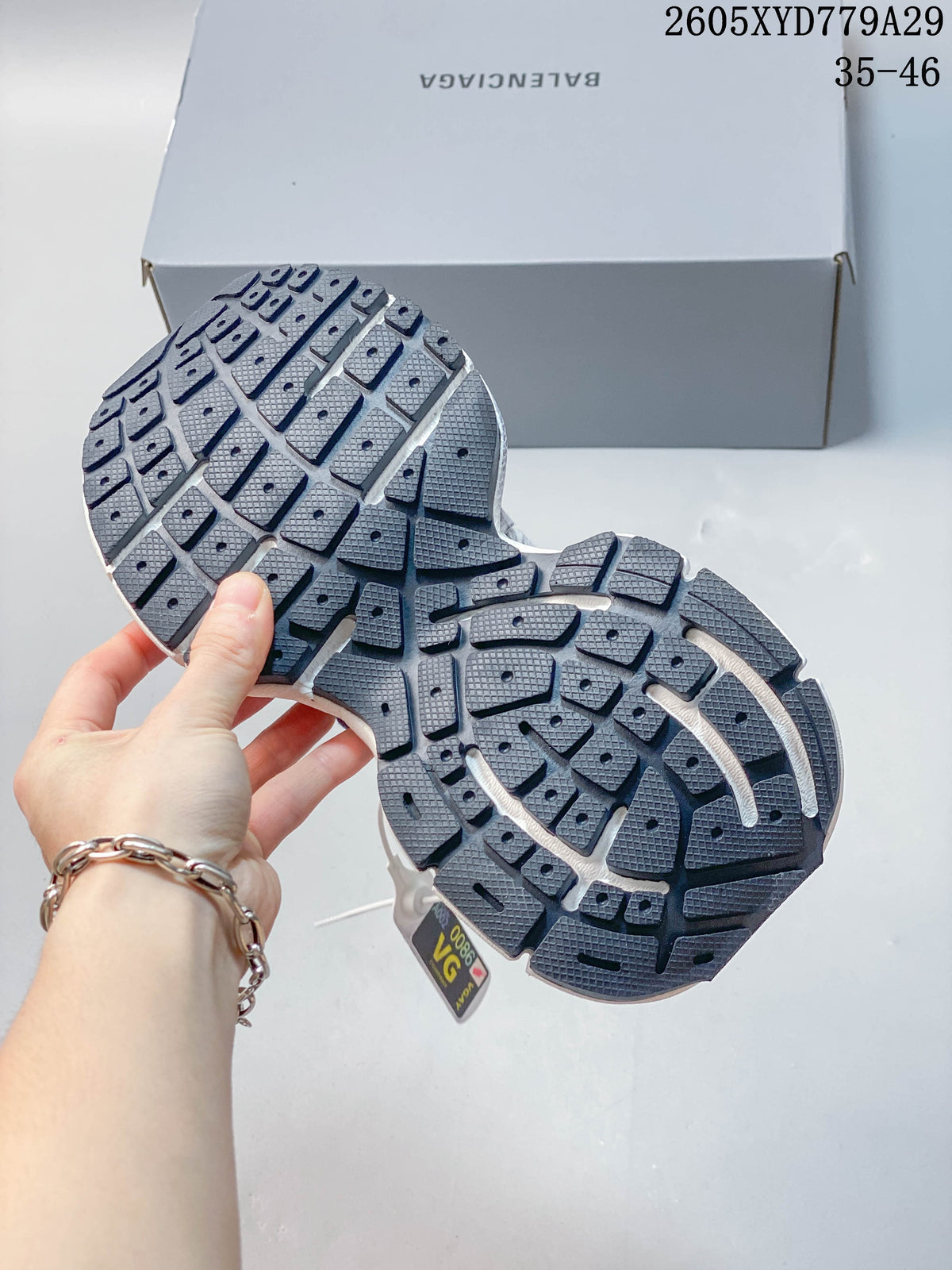 Close-up of the sneakers' segmented dark outsole