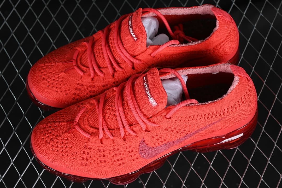 Pair of red Air VaporMax 2023 Flyknit sneakers viewed from above