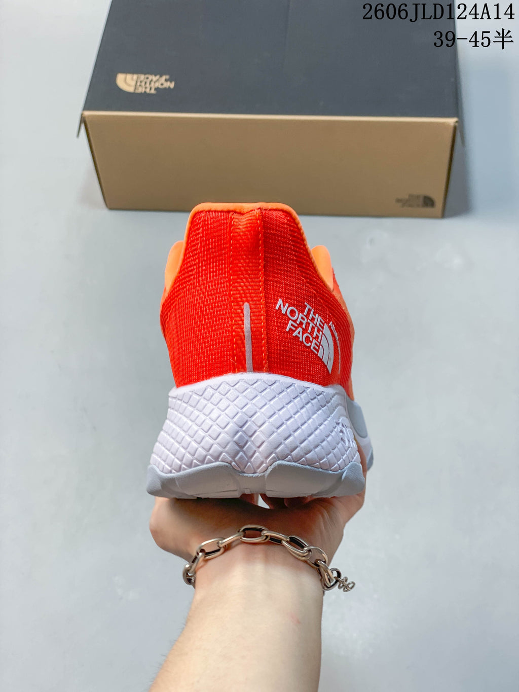 Rear view showing the red heel panel and The North Face logo