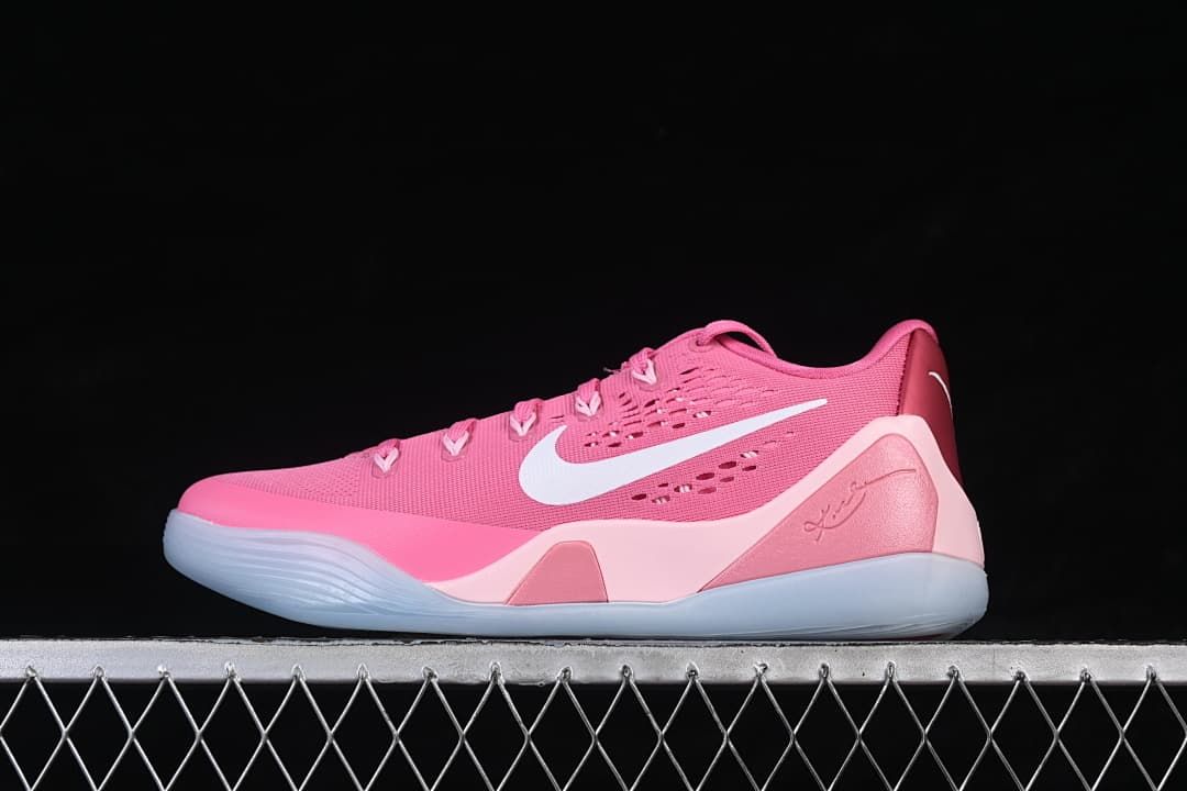 Opposite side view of the pink Kobe 9 Stitches Low basketball shoe