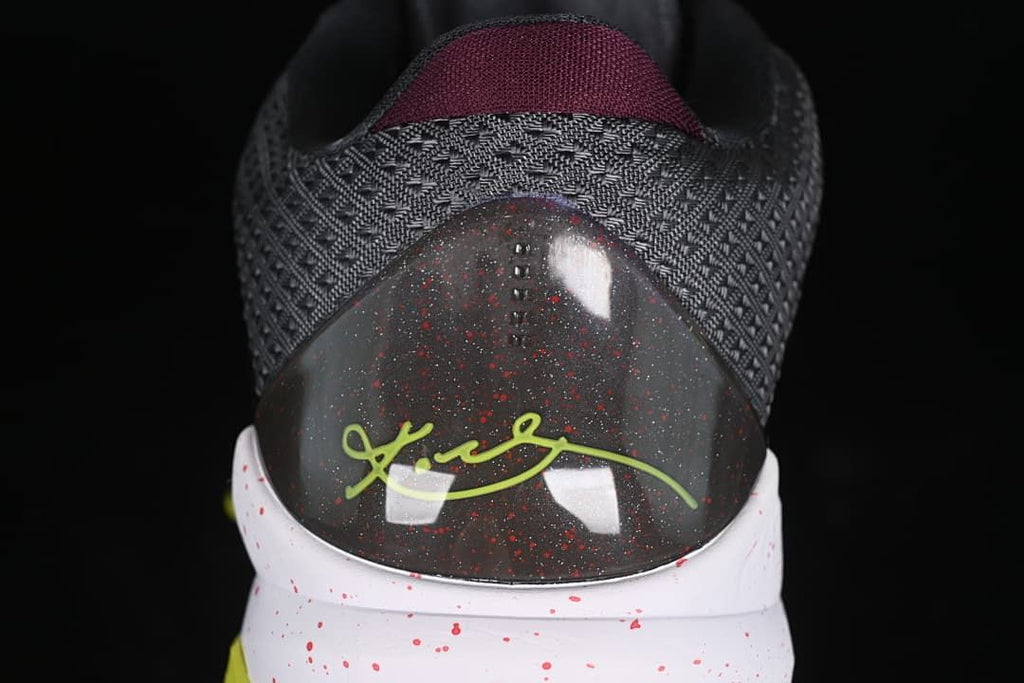Rear view showing the textured collar and signature-style heel graphic.
