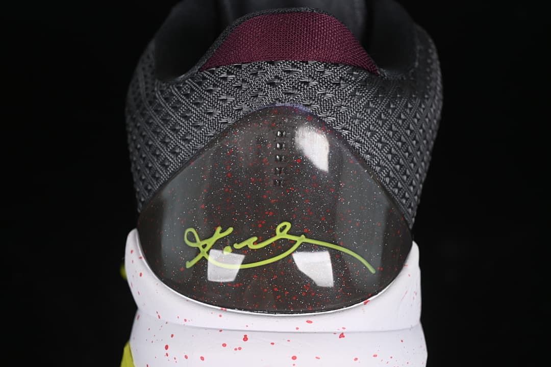 Rear view showing the textured collar and signature-style heel graphic.