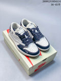 Pair of white and navy low-top sneakers with patterned side panels and contrasting laces