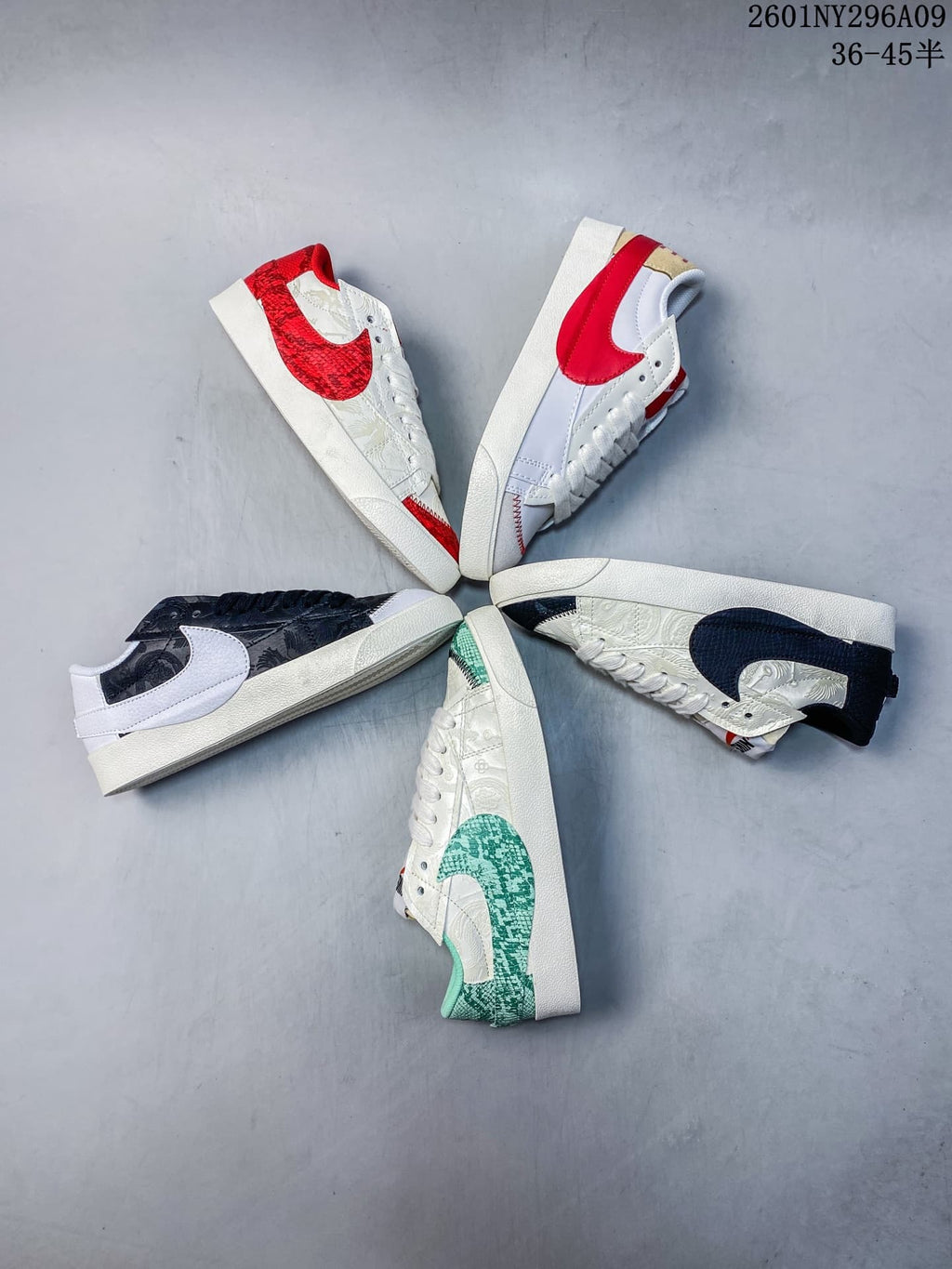 Several Nike Blazer Low '77 Jumbo colorways arranged together, including red, black, green and white accents.