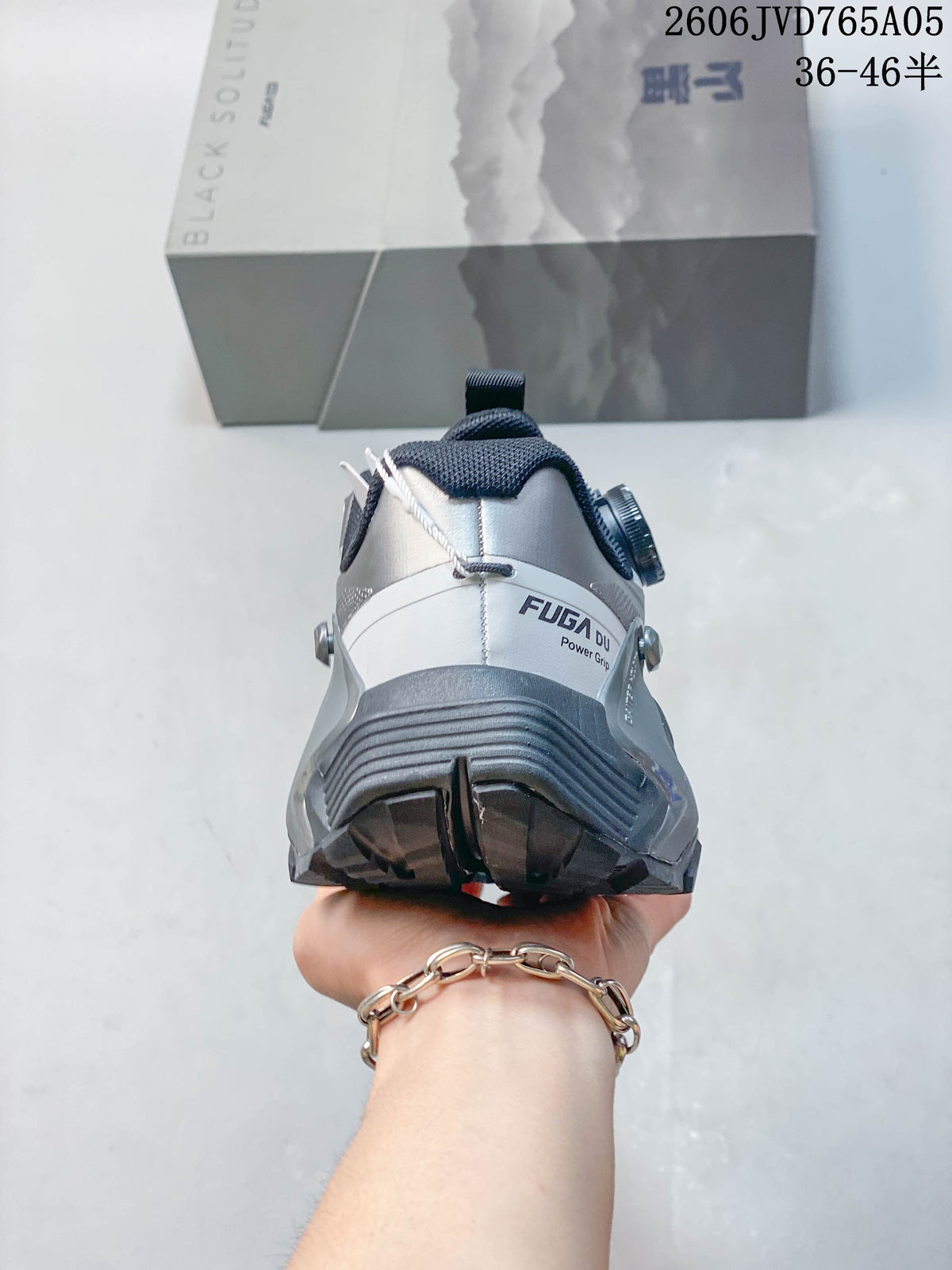 Rear view showing the shoe heel, external support structure, and outsole.
