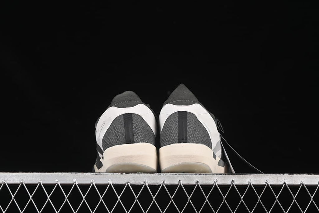Rear view of both shoes showing heel details