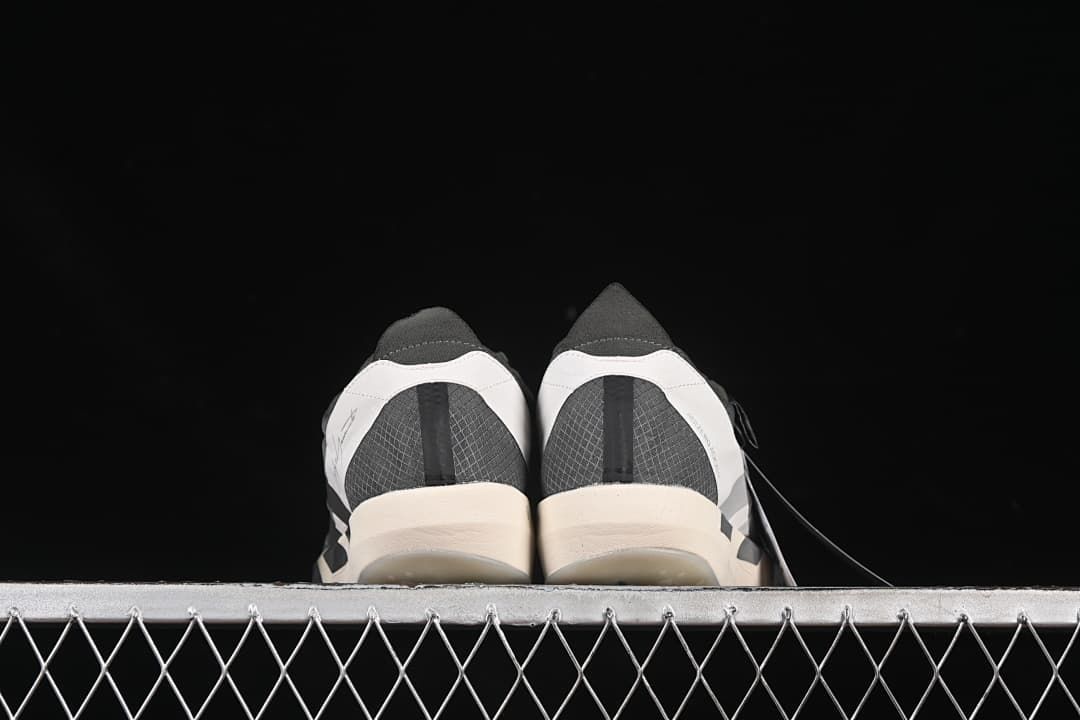 Rear view of both shoes showing heel details