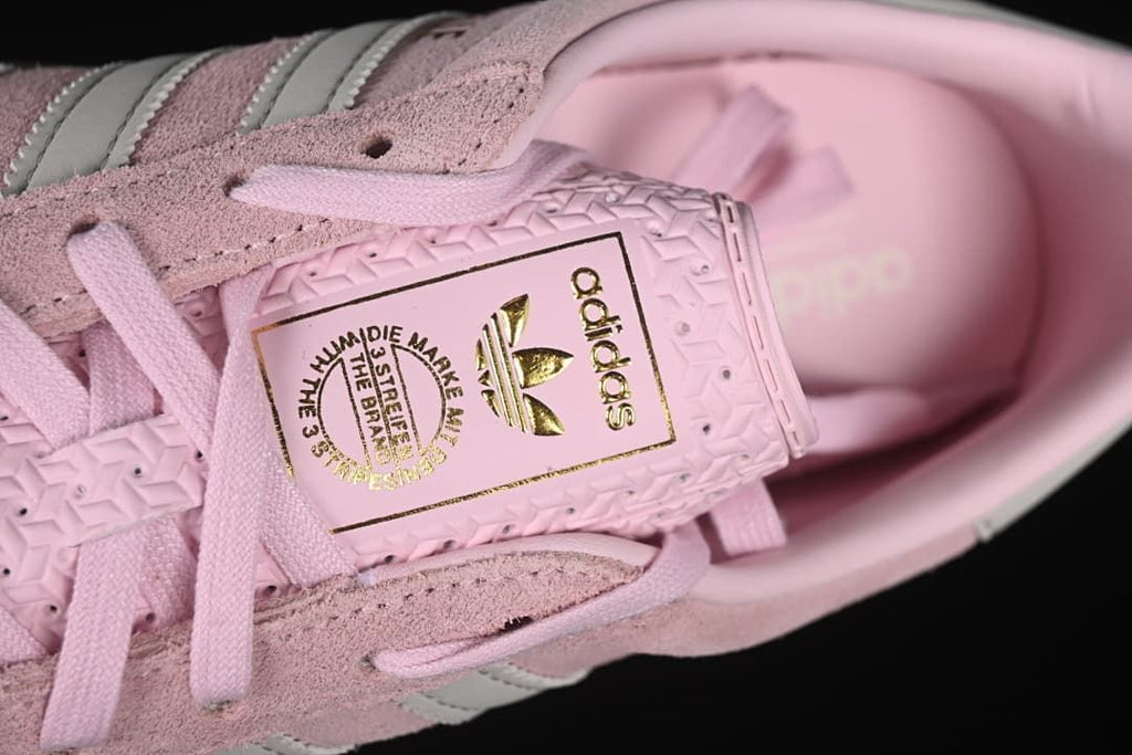 Close-up of the tongue label and pink laces