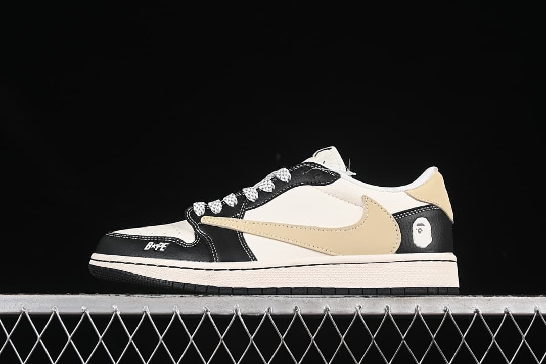 Side view of a black, off-white, and tan low-top sneaker with patterned laces and BAPE-style branding.