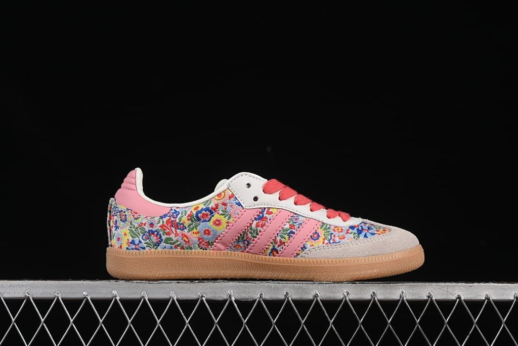 Side profile of the floral Samba OG sneaker with pink stripes and gum outsole.