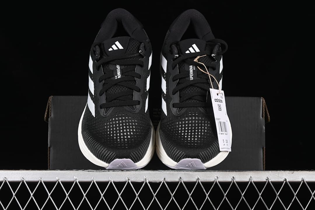 Front view of the pair showing the toe boxes, laces and tongue logos.