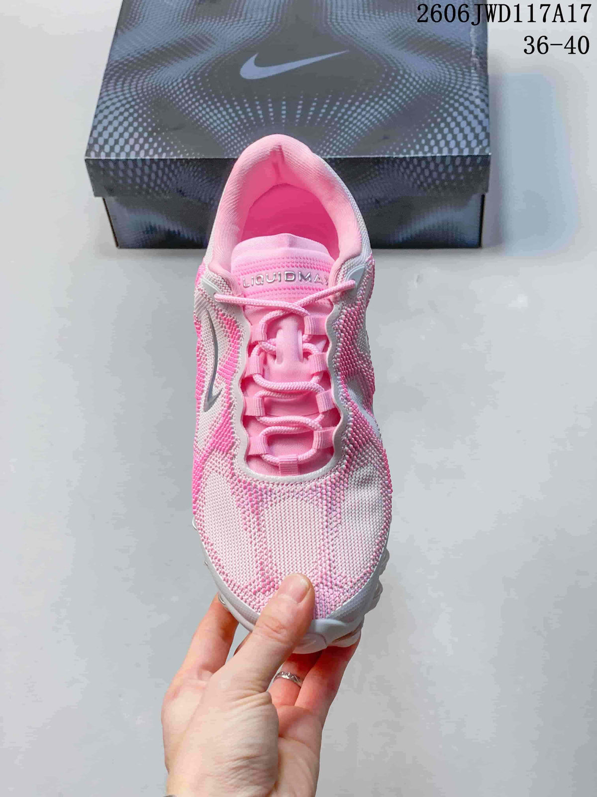 Top view of a pink and white Nike Air Liquid Max sneaker with lace-up closure