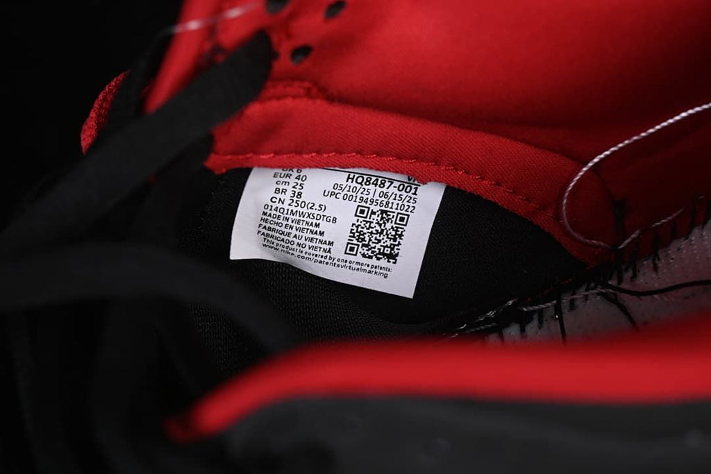 Shoe size label showing EU 40, style code HQ8487-001, and other sizing details