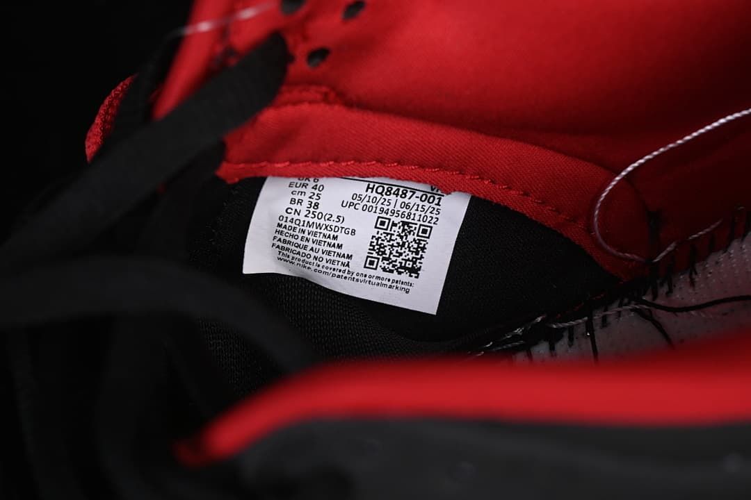 Shoe size label showing EU 40, style code HQ8487-001, and other sizing details