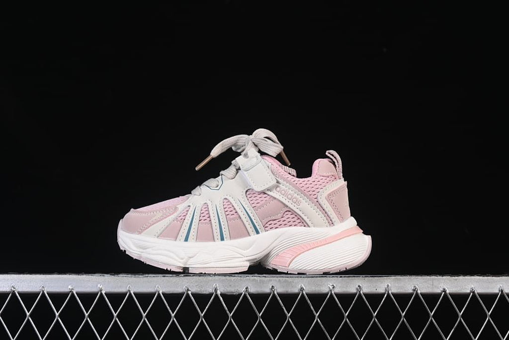 Pink and off-white adidas Adistar kids sneaker shown in side profile