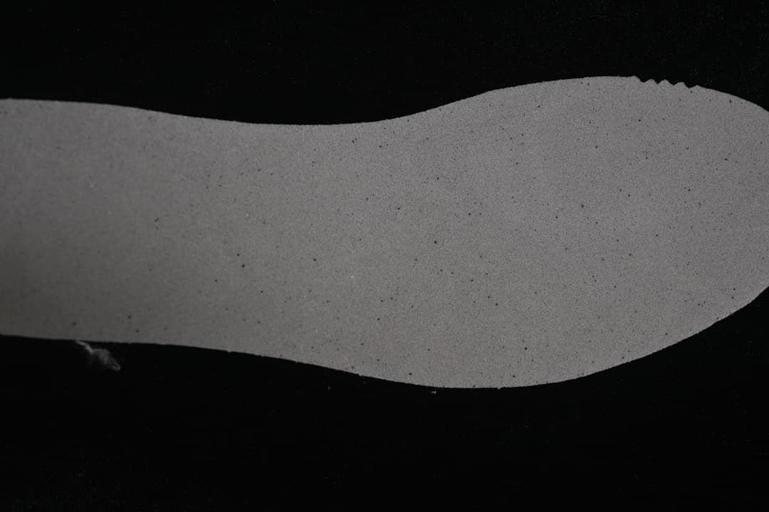 Close-up of the dark outsole and its textured tread.