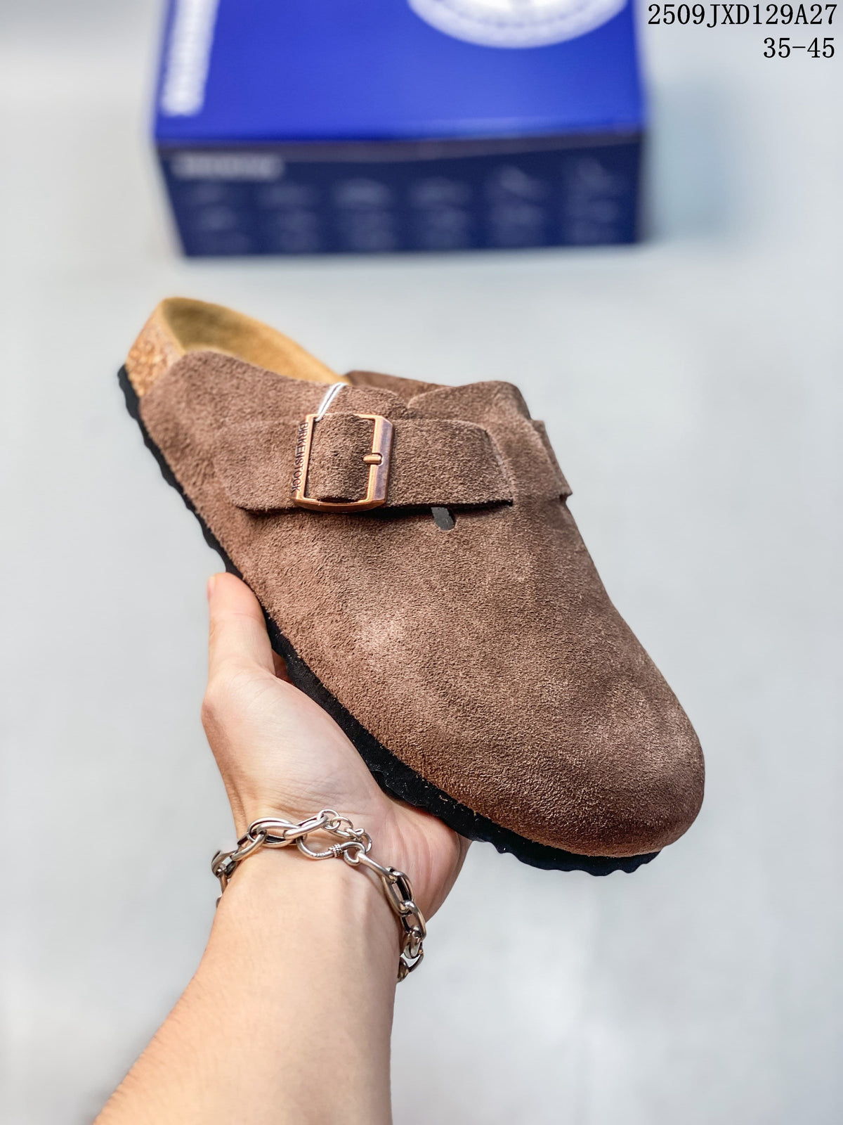 Angled view of the brown clog mule and its adjustable buckle