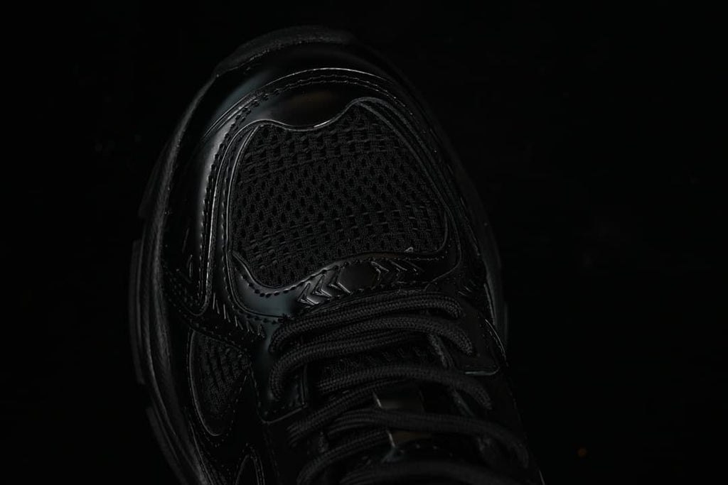 Top view of the sneaker's mesh-textured toe and lace area.