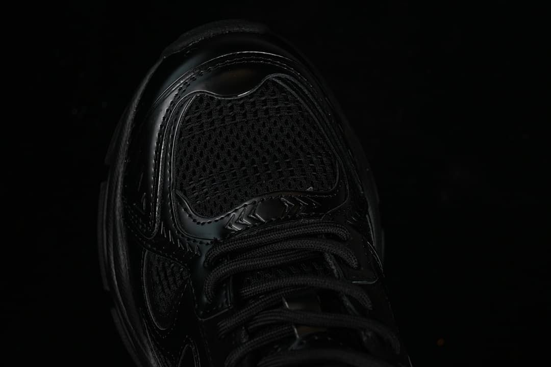 Top view of the sneaker's mesh-textured toe and lace area.