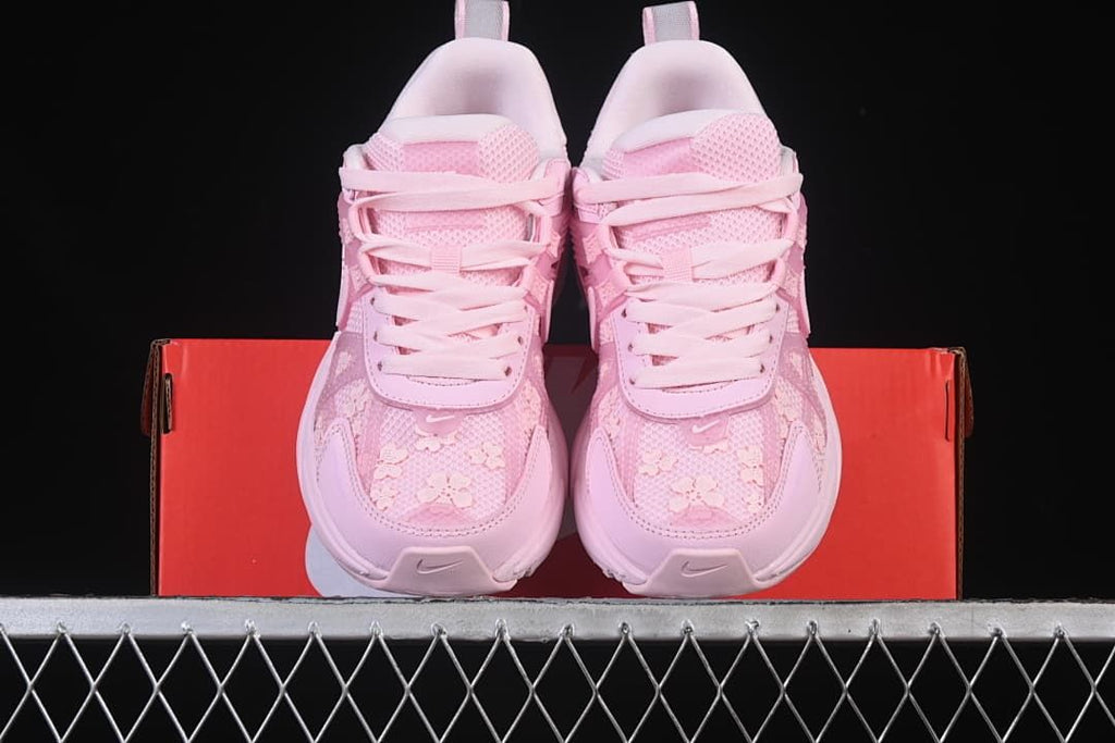 Front view of the pair showing the floral-patterned toe boxes