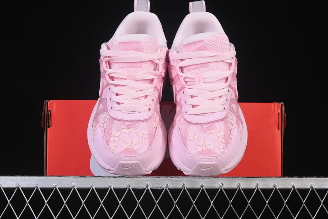 Front view of the pair showing the floral-patterned toe boxes