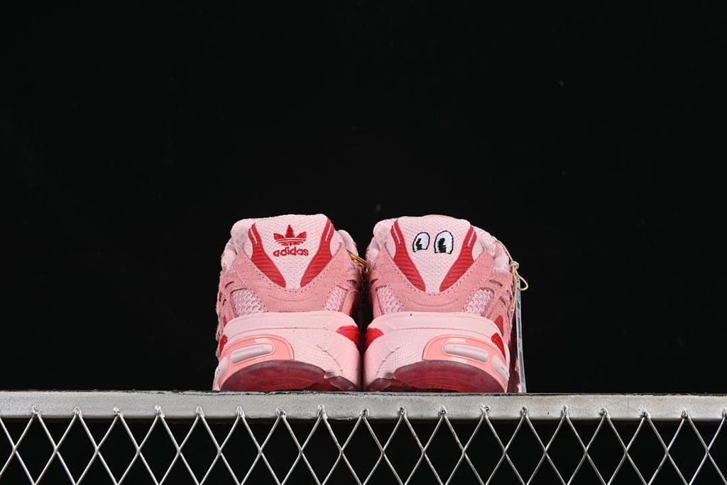 Rear view highlighting the heel details and red accents.