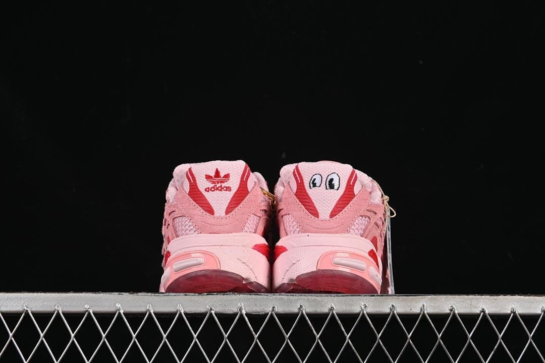 Rear view highlighting the heel details and red accents.