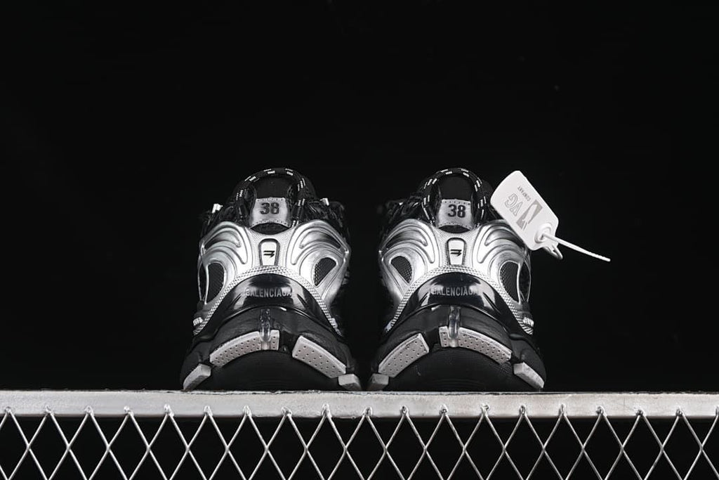 Rear view of the pair showing sculpted silver heel details.