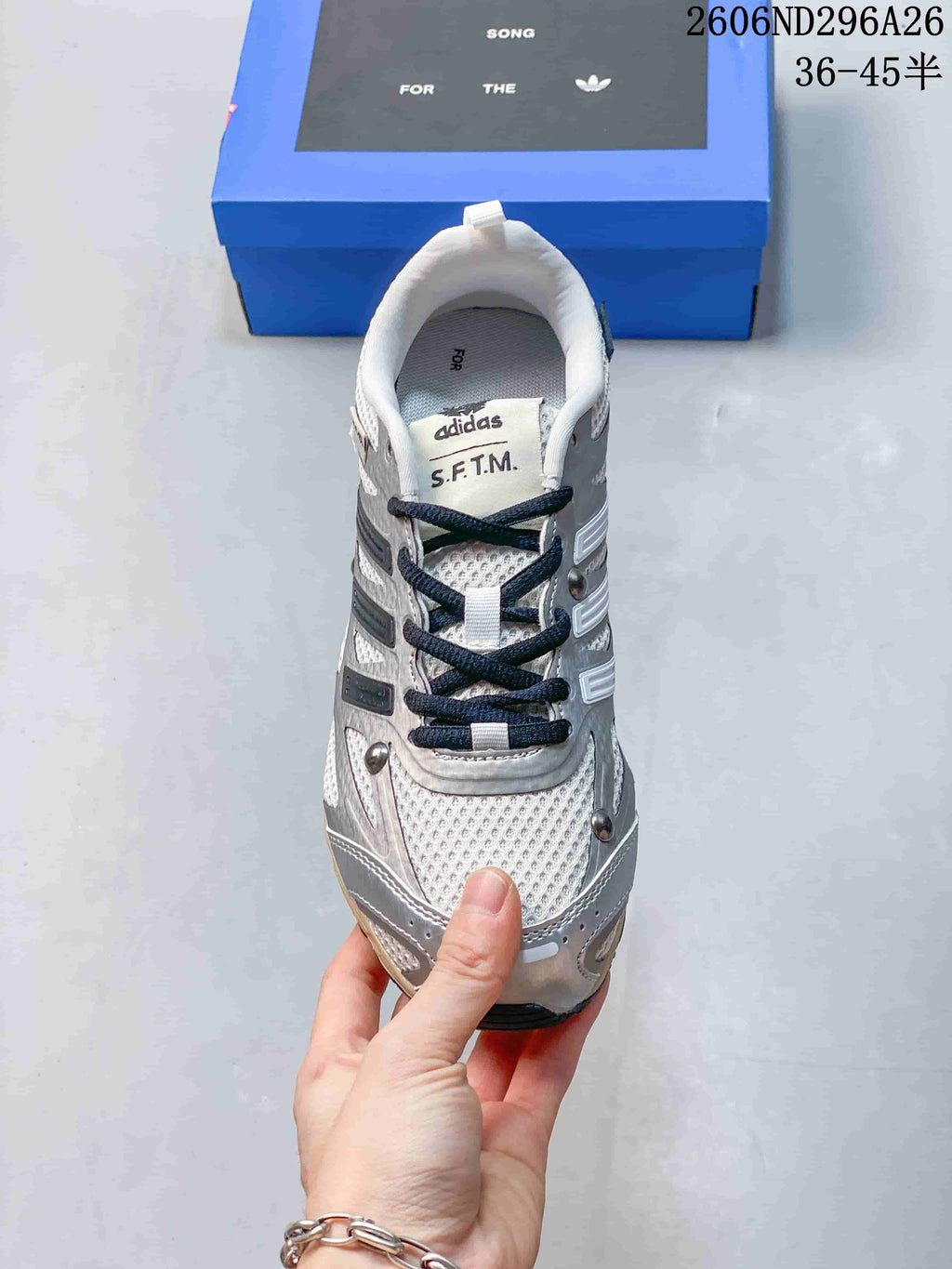 Front view showing the laces, toe and layered upper