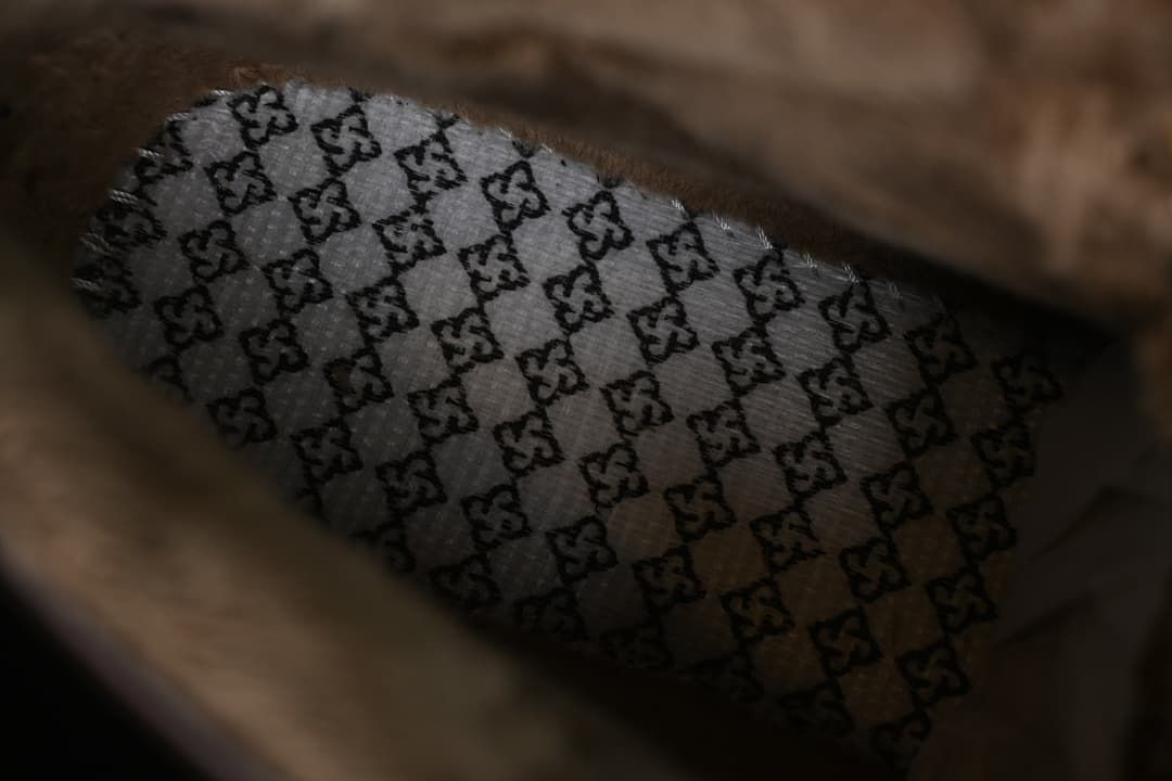 Close-up of patterned fabric inside the boot.