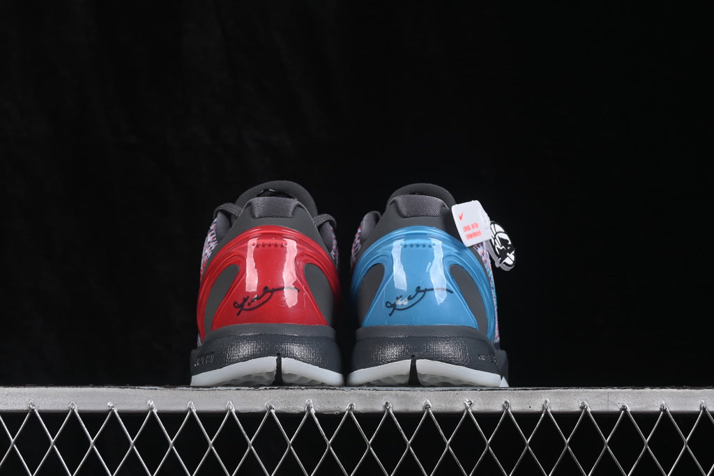 Rear view showing the mismatched red and blue heel panels, Kobe graphics, and translucent outsole sections.