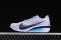 Side view of a light gray Nike ZoomX Vaporfly Next% 4 with dark blue Swoosh and accents