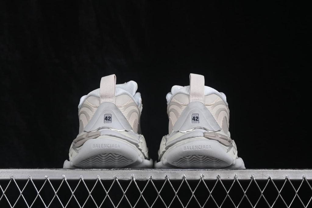 Rear view of the pair showing heel pull tabs, size markings and Balenciaga branding on the outsole.
