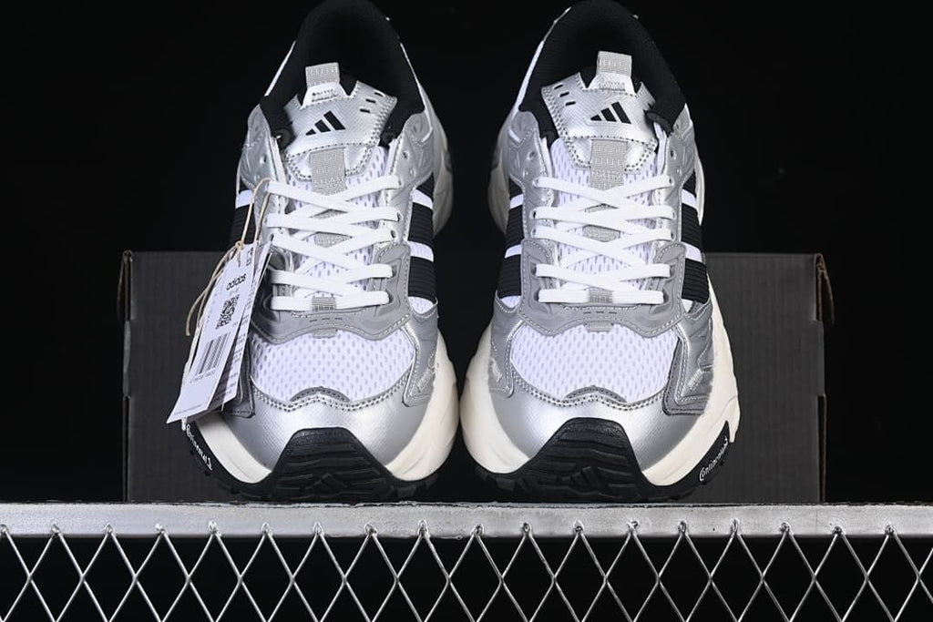 Front view of the pair showing toe panels and laces
