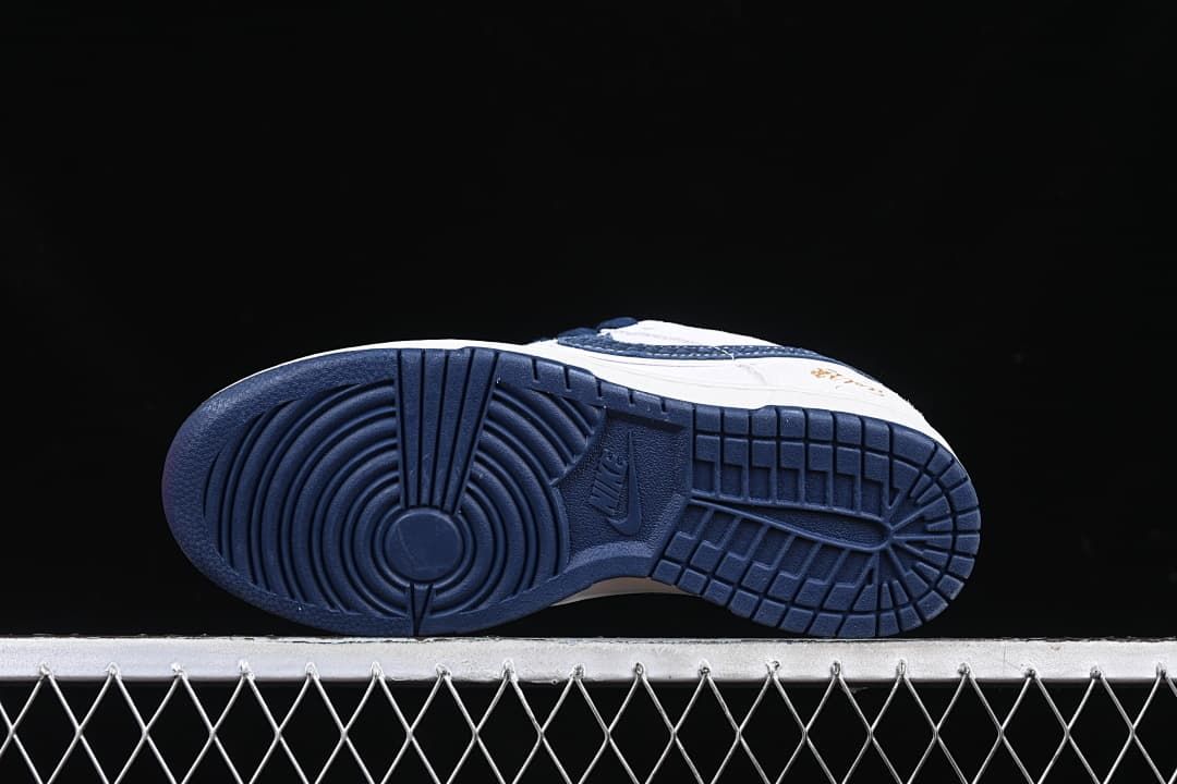 Underside view of the navy outsoles