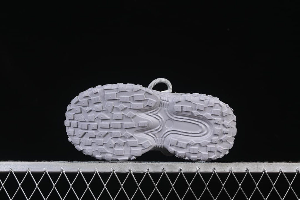 Underside view of the block-pattern sneaker outsole