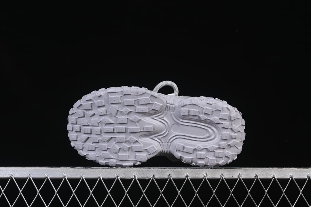 Underside view of the block-pattern sneaker outsole