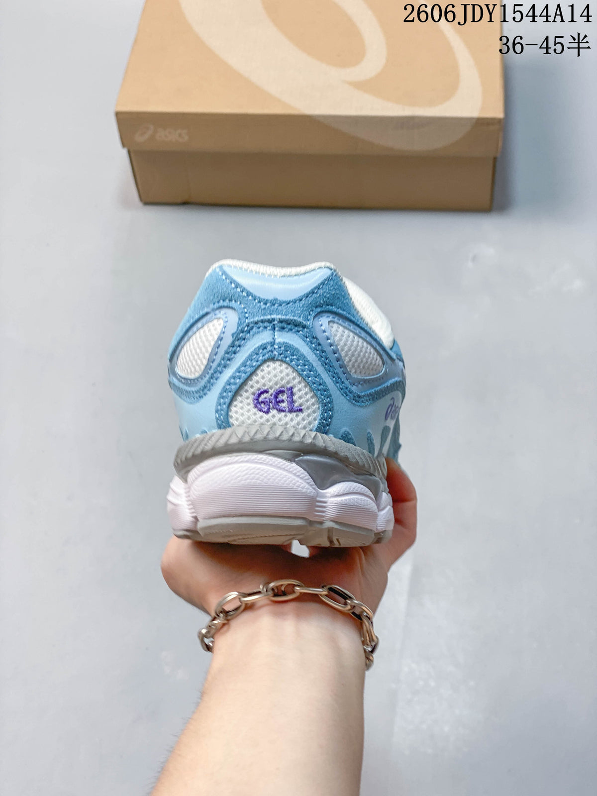 Rear view of the blue and white sneaker showing its heel and sole.