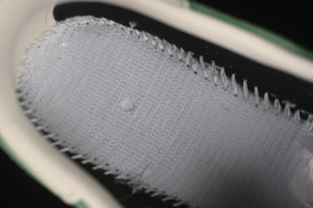 Close-up of the sneaker's interior lining and stitching