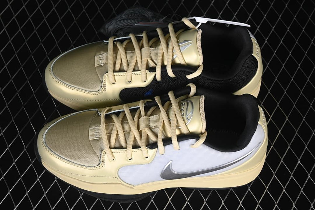 Pair of pale yellow and white Nike Ja 2 shoes