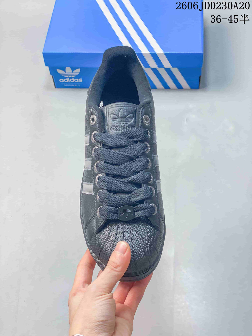 Top view of the laces, tongue, and shell toe