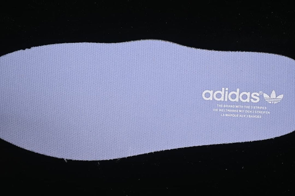 Lavender insole with adidas Trefoil branding