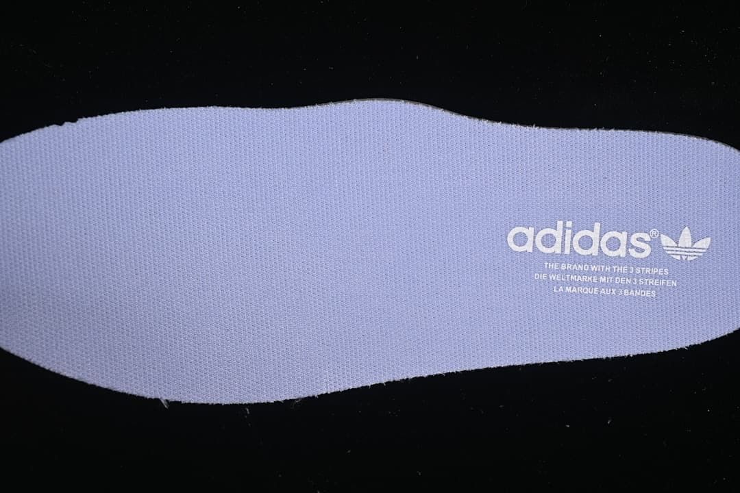Lavender insole with adidas Trefoil branding