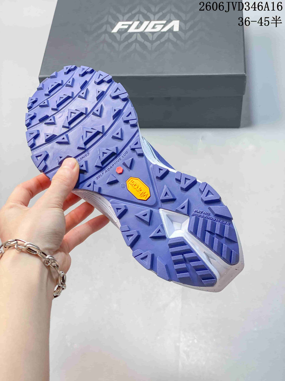 Close view of the purple lugged outsole on a Kailas FUGA EX3 shoe