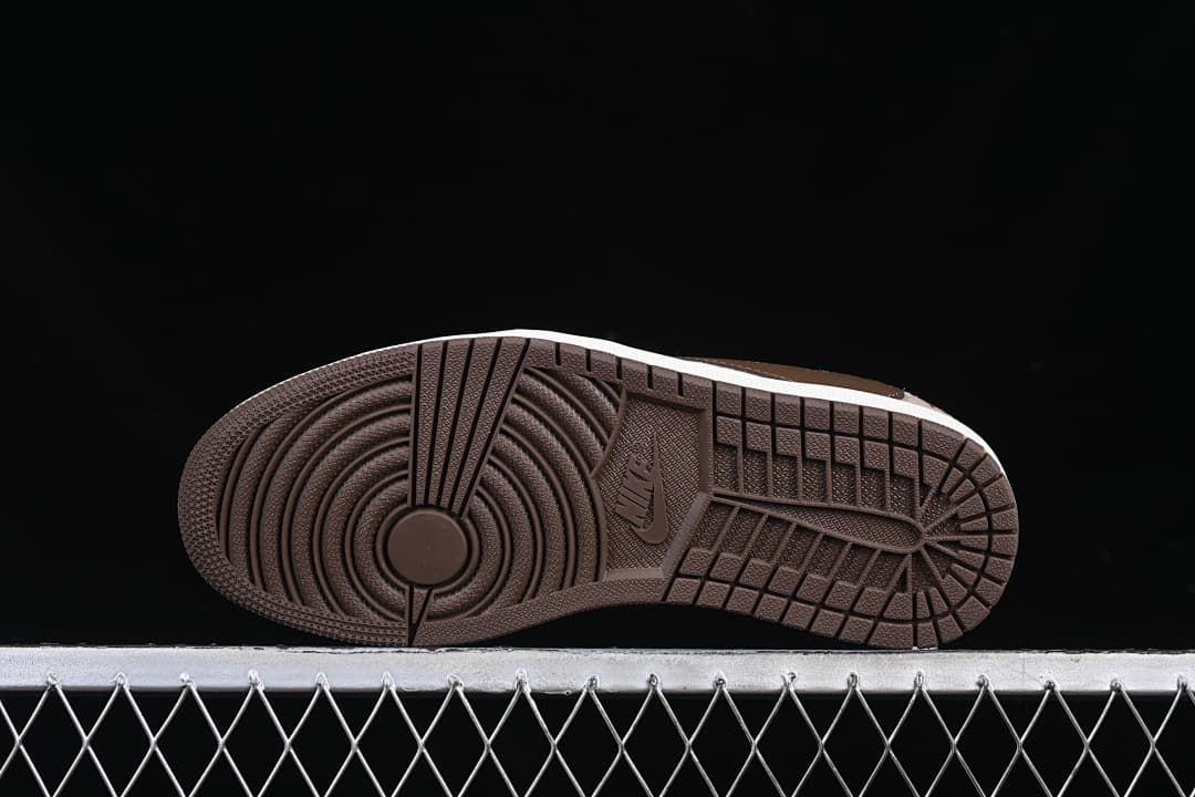 Underside view showing the dark brown outsole tread.