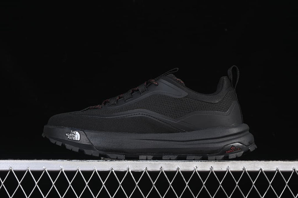 Black The North Face Offtrail Ve low-top shoe with red-accented laces, shown in profile