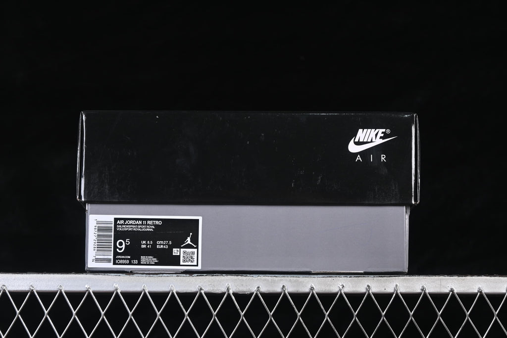 Nike Air shoebox with a product label showing Air Jordan 11 Retro, code IO8959-133, and EU size 43.