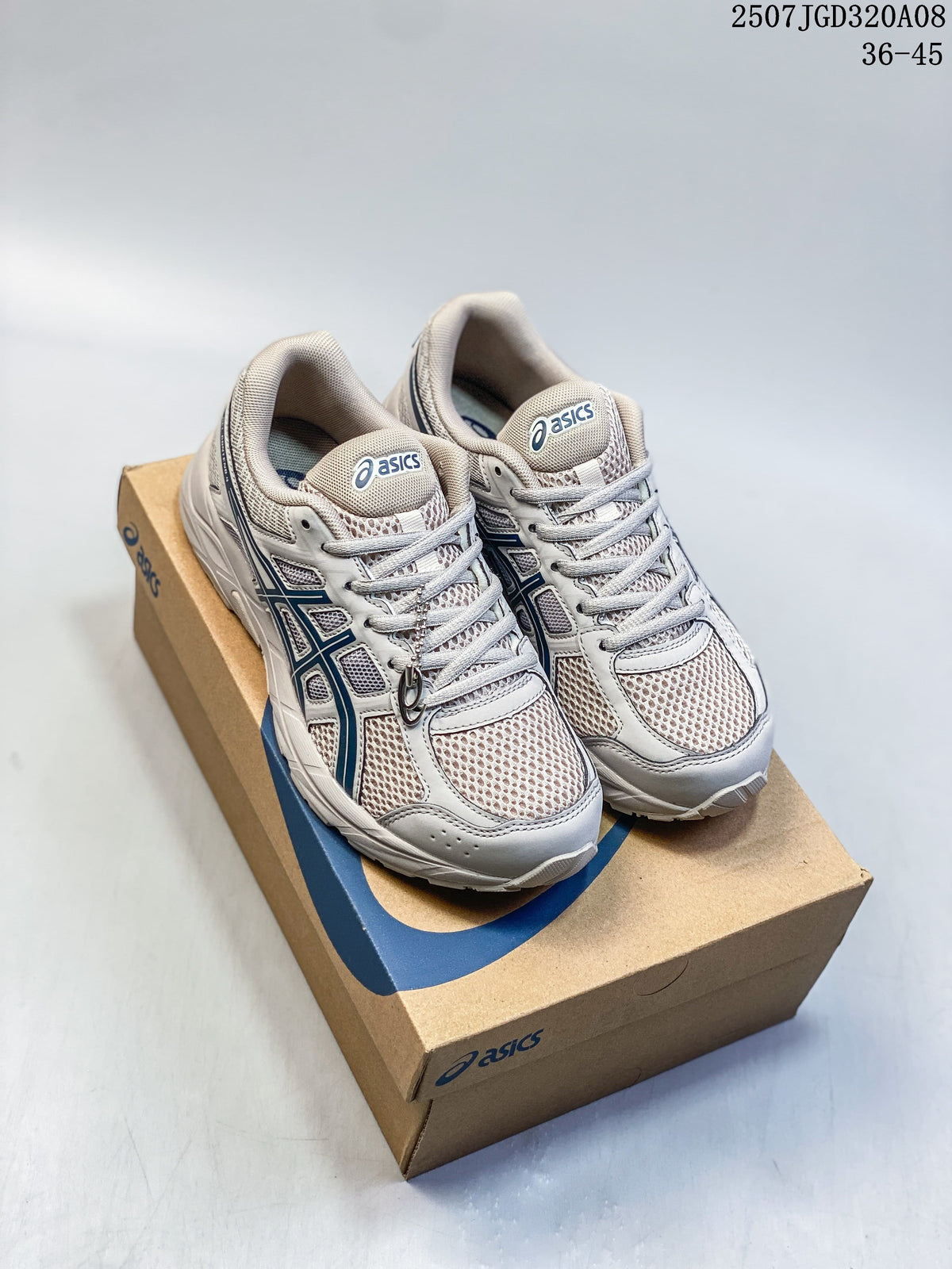 Pair of gray ASICS Gel-Contend 4 running shoes with navy detailing on a shoe box