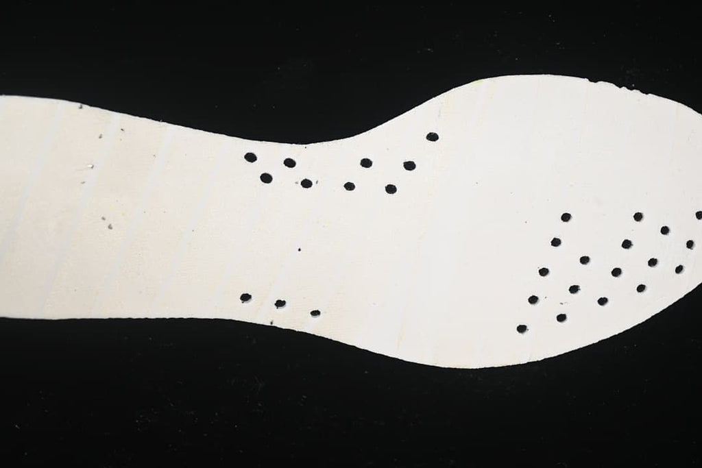 Light-colored shoe insert shown from above